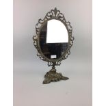 A SILVER PLATED DRESSING MIRROR AND FOUR VANITY MIRRORS