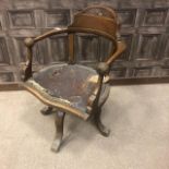 A 20TH CENTURY OAK CAPTAIN'S SWIVEL CHAIR