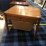 A MODERN TEAK NEEDLEWORK TABLE