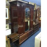 AN EARLY 20TH CENTURY MAHOGANY WARDROBE AND A DRESSING CHEST