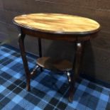 A MAHOGANY OVAL OCCASIONAL TABLE