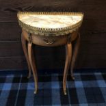 A FRENCH STYLE SEMI-CIRCULAR SIDE TABLE