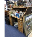 AN EARLY 20TH CENTURY OAK TAMBOUR FRONTED DESK