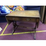 A 20TH CENTURY WALNUT SOFA TABLE