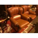 A MODERN BROWN LEATHER THREE PIECE SUITE