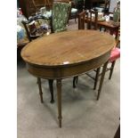 A MAHOGANY OVAL OCCASIONAL TABLE