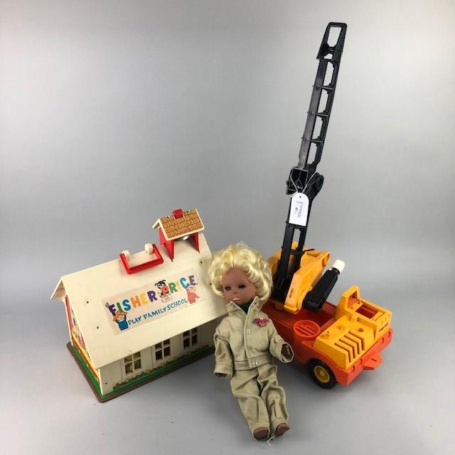 A FISHER PRICE BARN ALONG WITH A CRANE AND DOLL