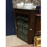 A 19TH CENTURY MAHOGANY WALL MOUNTING CORNER DISPLAY CABINET