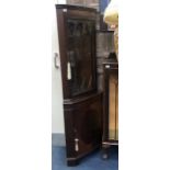 A PAIR OF TWO REPRODUCTION MAHOGANY CORNER CUPBOARDS