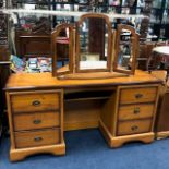 A MODERN DRESSING TABLE, CHEST OF DRAWERS AND A PAIR OF BEDSIDE CHESTS