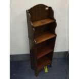 AN EDWARDIAN MAHOGANY OPEN BOOKCASE