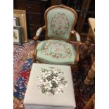 AN OTTOMAN WITH TAPESTRY PANEL TOP AND A FRENCH STYLE ARMCHAIR