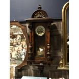 A LATE VICTORIAN WALNUT WALL CLOCK