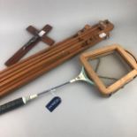 A FOLDING EASEL, CRUCIFIX AND BADMINTON RACQUET