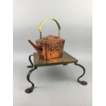 A COPPER AND BRASS TEA KETTLE, PAIR OF BRASS CANDLESTICKS AND A BRASS STAND