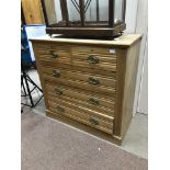 AN EDWARDIAN CHEST OF DRAWERS