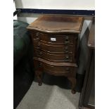 A MAHOGANY CHEST OF FOUR DRAWERS