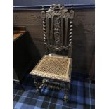 AN EARLY 20TH CENTURY OAK HALL CHAIR AND AN INLAID MAHOGANY CHAIR