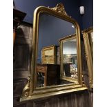 A VICTORIAN STYLE GILT OVERMANTEL MIRROR