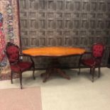 A REPRODUCTION ITALIAN STYLE WALNUT DINING TABLE AND SIX CHIARS