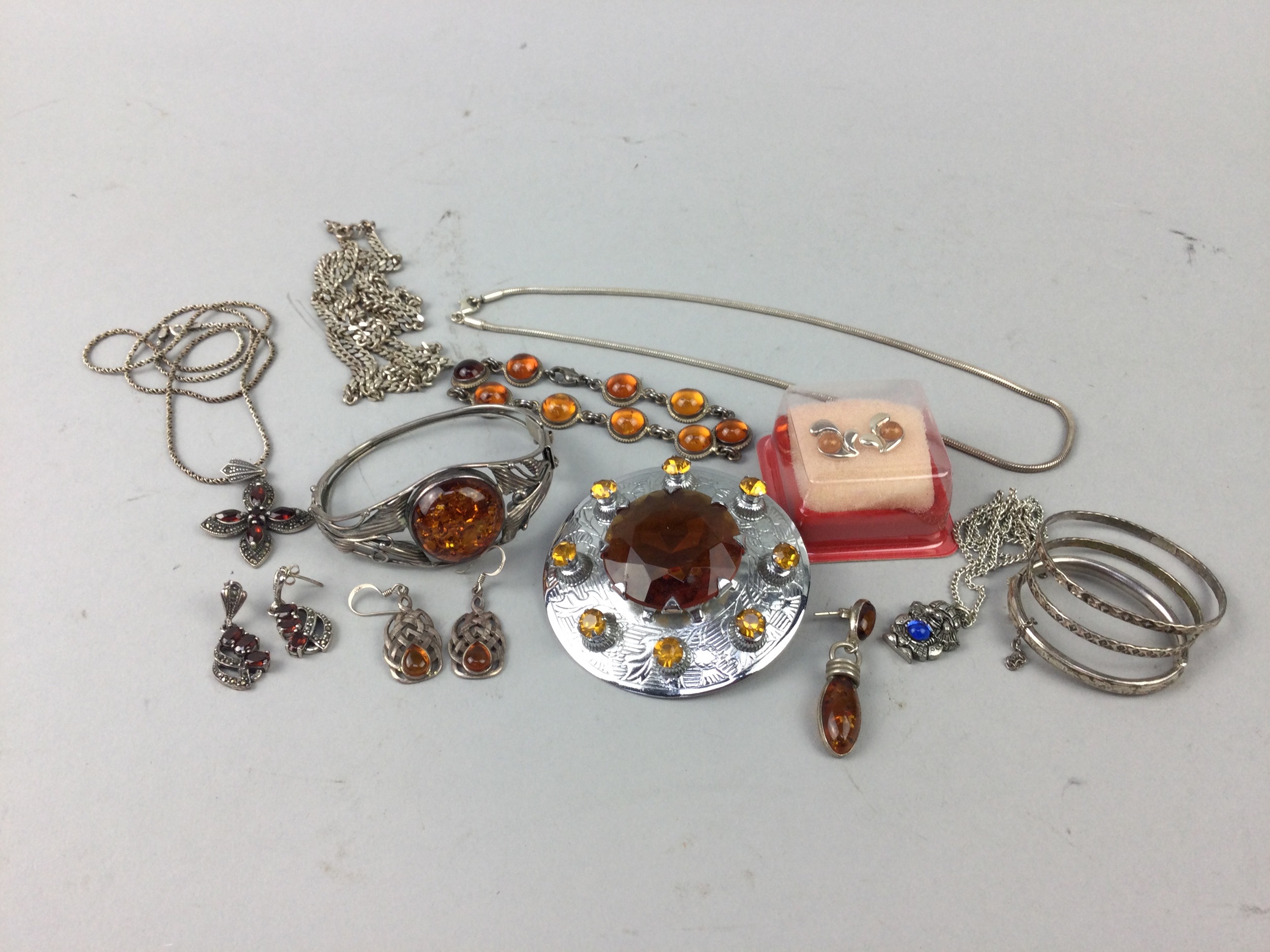 A LOT OF SILVER AND OTHER COSTUME JEWELLERY