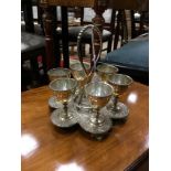 A SILVER PLATED SIX EGG CUP EPERGNE