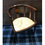 AN EDWARDIAN MAHOGANY TUB CHAIR