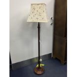 A MAHOGANY STANDARD LAMP
