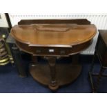 A STAINED WOOD DEMI LUNE TWO TIER HALL TABLE AND AN OAK BEDISDE TABLE