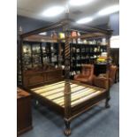 A VICTORIAN STYLE FOUR POSTER BED