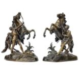 A PAIR OF VICTORIAN BRONZE MARLEY HORSES AFTER COUSTOU