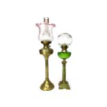 A BRASS OIL LAMP AND ANOTHER LAMP