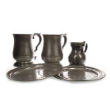 A LOT OF TWO 18TH CENTURY PEWTER PLATES ALONG WITH THREE VICTORIAN MEASURES