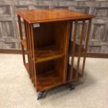 A REPRODUCTION MAHOGANY TWO TIER REVOLVING BOOKCASE