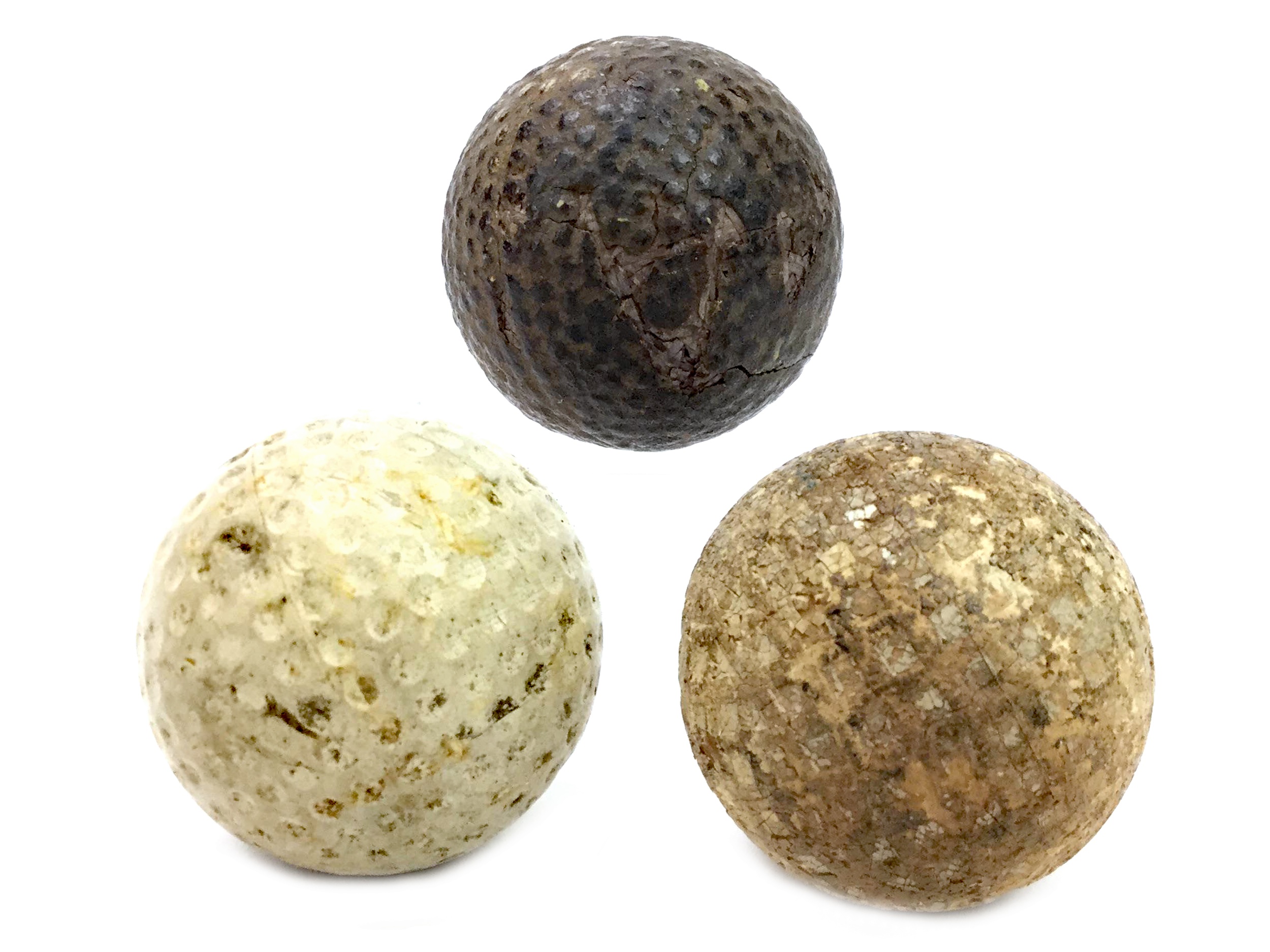 AN LATE 19TH/EARLY 20TH CENTURY HASKELL TYPE GOLF BALL ALONG WITH TWO OTHERS