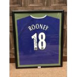 AN EVERTON REPLICA JERSEY SIGNED BY WAYNE ROONEY