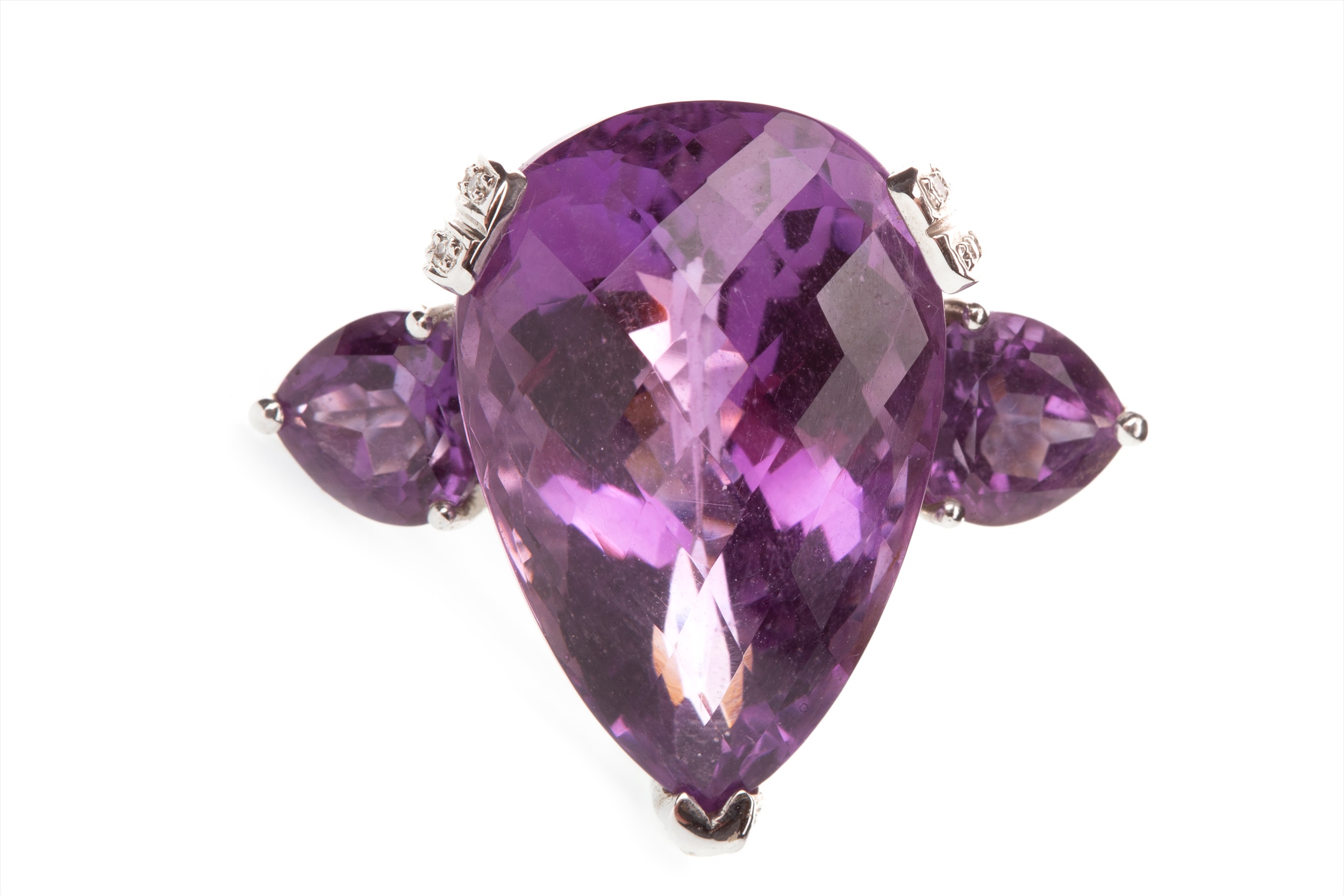 A PURPLE GEM AND DIAMOND COCKTAIL RING