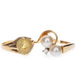 A YELLOW GEM SET RING AND A PEARL RING