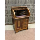 A WALNUT CYLINDER TOP BUREAU BY TEES & CO OF MONTREAL