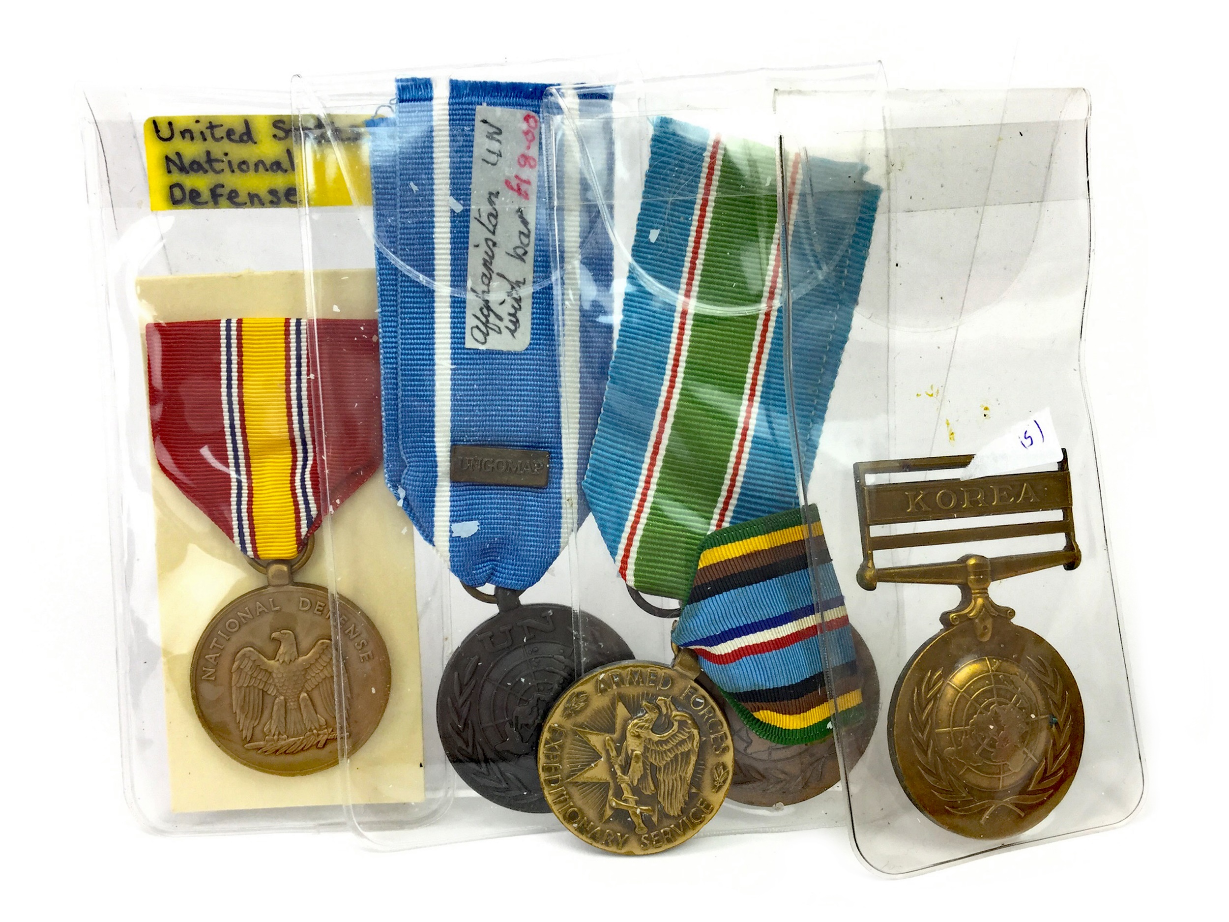 A LOT OF THREE UNITED NATIONS MEDALS AND TWO U. S. MEDALS