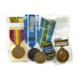 A LOT OF THREE UNITED NATIONS MEDALS AND TWO U. S. MEDALS