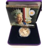 A THE ROYAL MINT GOLD CROWN