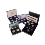 FIVE SILVER COIN SETS