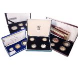 FOUR SILVER COIN SETS