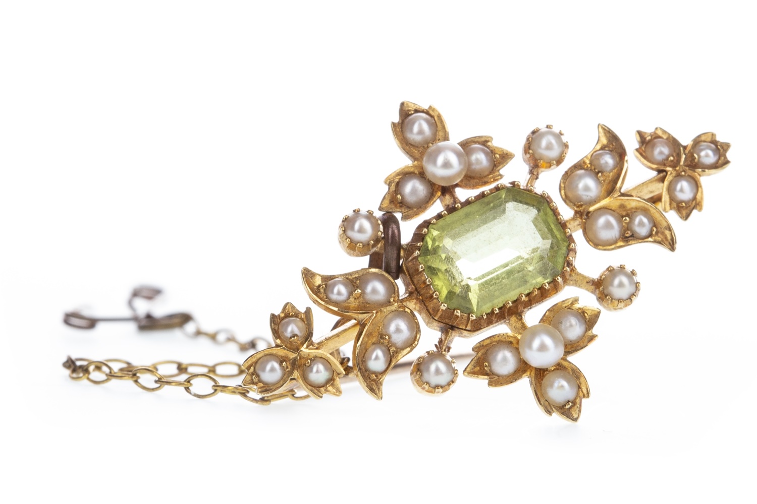 AN EDWARDIAN GEM AND SEED PEARL BROOCH