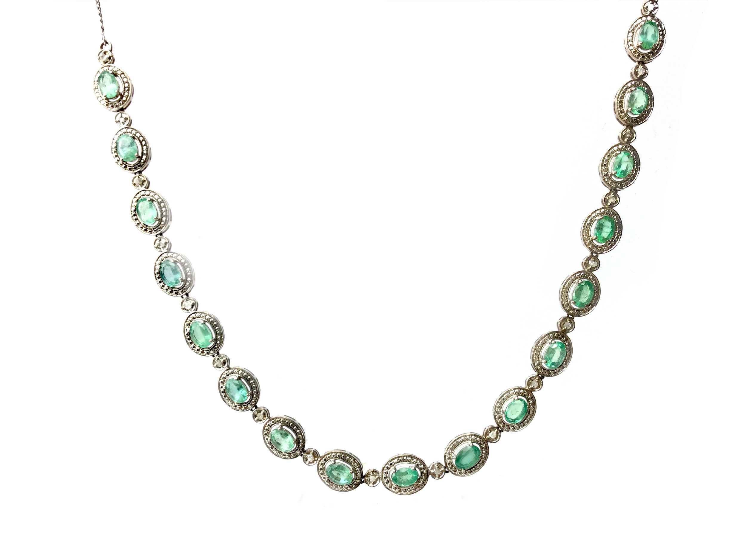 A GREEN GEM AND DIAMOND NECKLACE AND EARRINGS