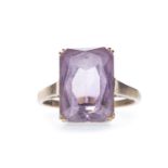 AN AMETHYST SINGLE STONE RING