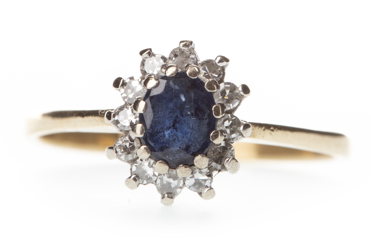 A SAPPHIRE AND DIAMOND RING