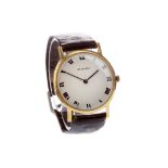 A GENTLEMAN'S BUECHE GIROD GOLD MANUAL WIND WRIST WATCH