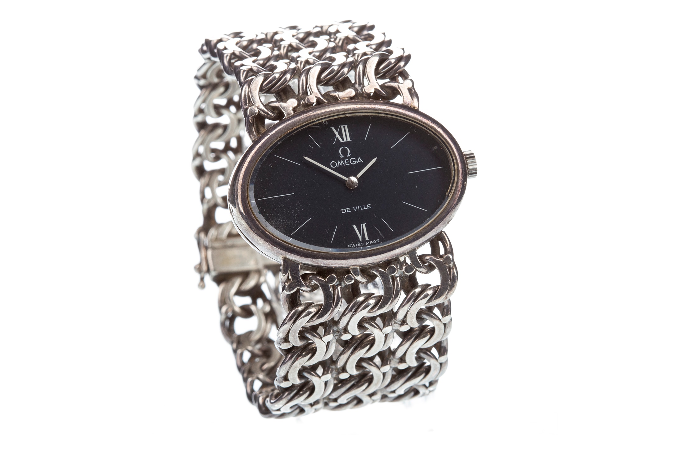 A LADY'S SILVER OMEGA DE VILLE SILVER WATCH